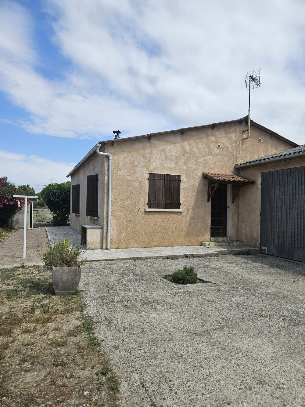 Maison T3 de plain-pied avec jardin et garage